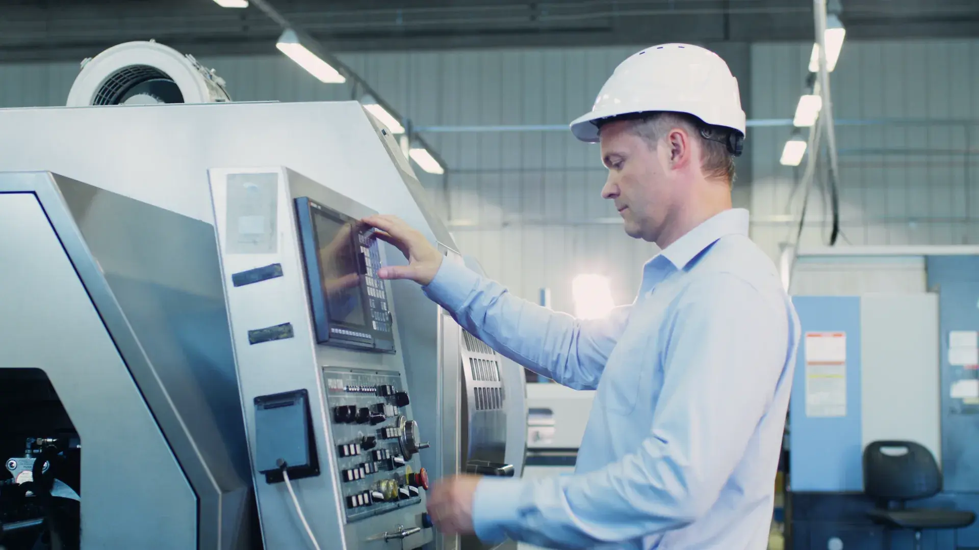Technician working at a precision industrial machine